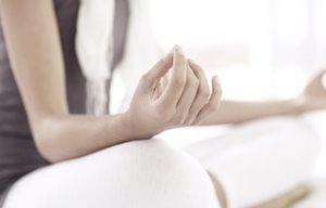 Woman doing yoga.